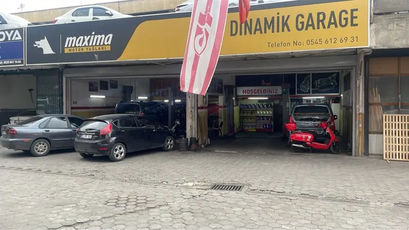 Dinamik Garage logo